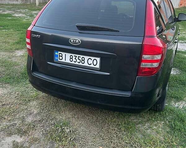 Чорний Кіа Сід, об'ємом двигуна 1.6 л та пробігом 155 тис. км за 5800 $, фото 9 на Automoto.ua