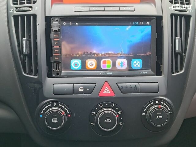 Чорний Кіа Сід, об'ємом двигуна 1.6 л та пробігом 261 тис. км за 6990 $, фото 24 на Automoto.ua