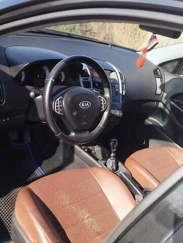 Черный Киа Сид, объемом двигателя 1.58 л и пробегом 317 тыс. км за 5000 $, фото 1 на Automoto.ua