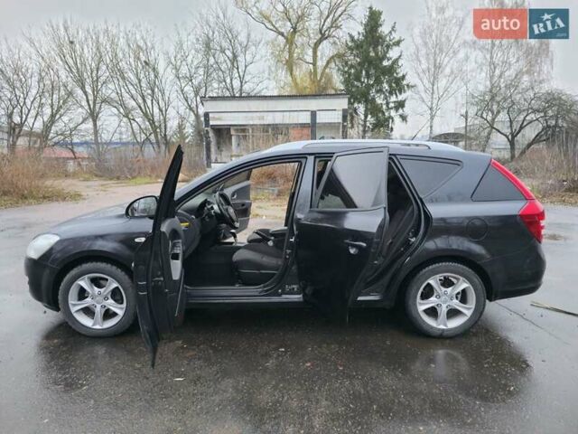 Чорний Кіа Сід, об'ємом двигуна 1.6 л та пробігом 216 тис. км за 6500 $, фото 6 на Automoto.ua