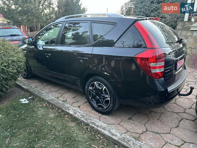 Чорний Кіа Сід, об'ємом двигуна 1.4 л та пробігом 182 тис. км за 6200 $, фото 5 на Automoto.ua