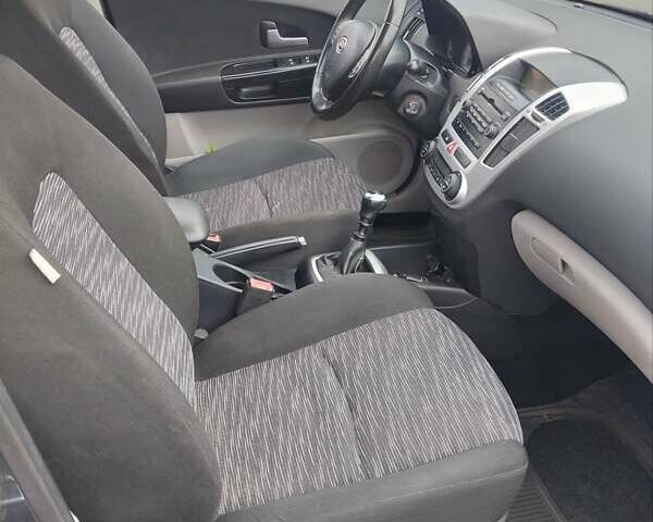 Чорний Кіа Сід, об'ємом двигуна 1.58 л та пробігом 200 тис. км за 4940 $, фото 1 на Automoto.ua