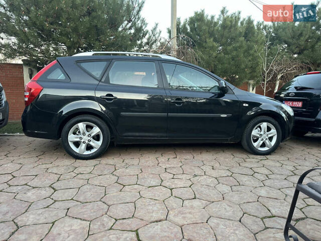 Чорний Кіа Сід, об'ємом двигуна 1.6 л та пробігом 203 тис. км за 6500 $, фото 3 на Automoto.ua