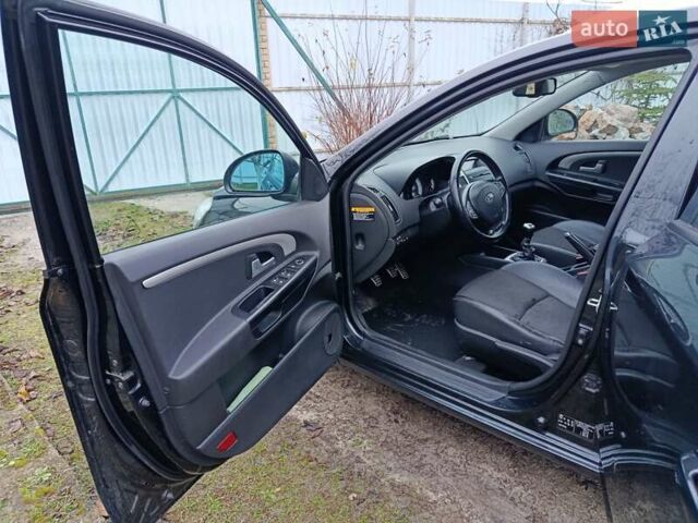Черный Киа Сид, объемом двигателя 2 л и пробегом 251 тыс. км за 3500 $, фото 15 на Automoto.ua