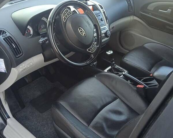 Черный Киа Сид, объемом двигателя 1.6 л и пробегом 222 тыс. км за 6350 $, фото 7 на Automoto.ua