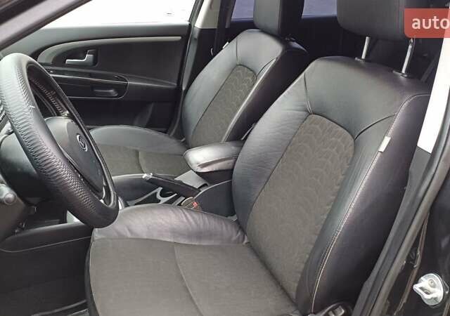 Черный Киа Сид, объемом двигателя 2 л и пробегом 195 тыс. км за 6499 $, фото 36 на Automoto.ua