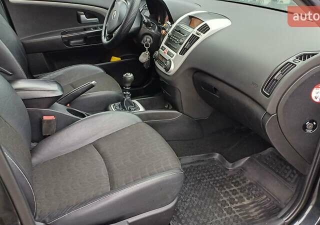 Черный Киа Сид, объемом двигателя 2 л и пробегом 195 тыс. км за 6499 $, фото 19 на Automoto.ua