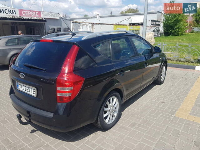 Черный Киа Сид, объемом двигателя 1.4 л и пробегом 225 тыс. км за 7200 $, фото 6 на Automoto.ua