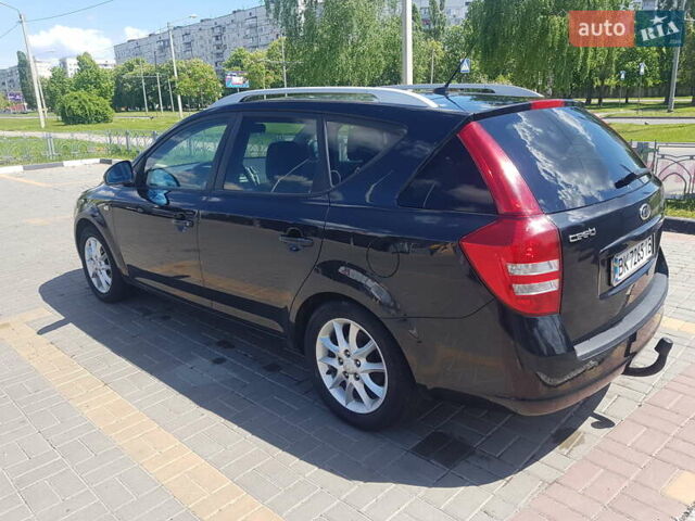 Черный Киа Сид, объемом двигателя 1.4 л и пробегом 225 тыс. км за 7200 $, фото 4 на Automoto.ua
