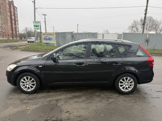 Чорний Кіа Сід, об'ємом двигуна 1.4 л та пробігом 204 тис. км за 6350 $, фото 3 на Automoto.ua