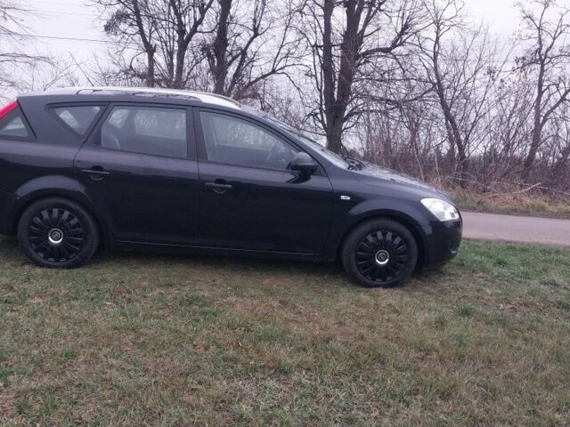 Чорний Кіа Сід, об'ємом двигуна 1.4 л та пробігом 230 тис. км за 5550 $, фото 1 на Automoto.ua
