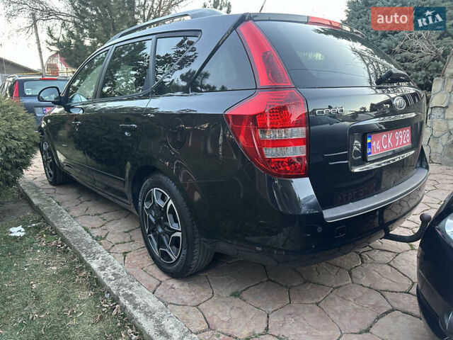 Чорний Кіа Сід, об'ємом двигуна 1.4 л та пробігом 182 тис. км за 6200 $, фото 6 на Automoto.ua