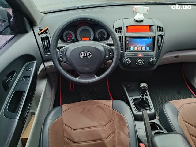 Чорний Кіа Сід, об'ємом двигуна 1.6 л та пробігом 261 тис. км за 6990 $, фото 12 на Automoto.ua