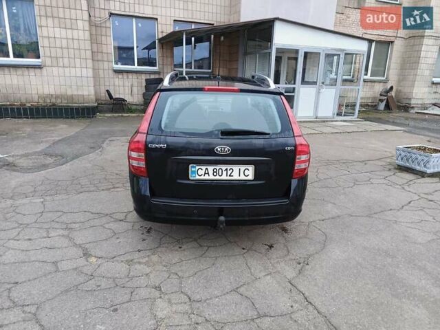 Черный Киа Сид, объемом двигателя 1.58 л и пробегом 180 тыс. км за 5500 $, фото 4 на Automoto.ua