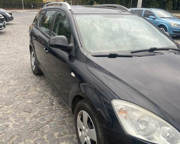 Черный Киа Сид, объемом двигателя 1.4 л и пробегом 227 тыс. км за 4800 $, фото 1 на Automoto.ua