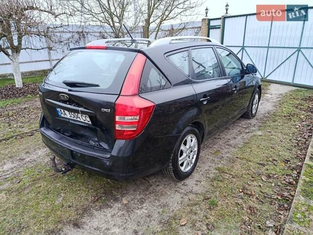 Черный Киа Сид, объемом двигателя 2 л и пробегом 251 тыс. км за 3500 $, фото 5 на Automoto.ua