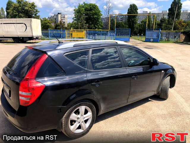 Чорний Кіа Сід, об'ємом двигуна 1.6 л та пробігом 255 тис. км за 7100 $, фото 4 на Automoto.ua