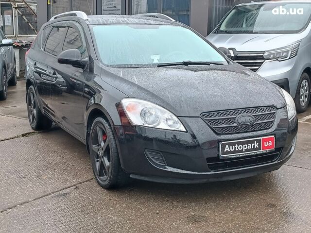 Чорний Кіа Сід, об'ємом двигуна 1.6 л та пробігом 261 тис. км за 6990 $, фото 5 на Automoto.ua