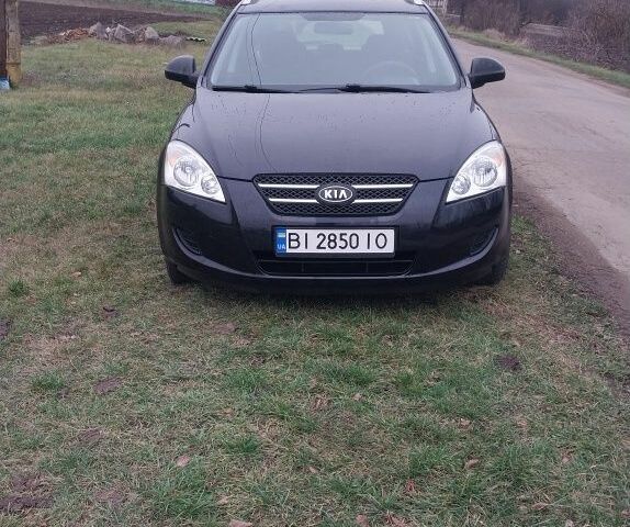 Чорний Кіа Сід, об'ємом двигуна 1.4 л та пробігом 237 тис. км за 4897 $, фото 1 на Automoto.ua