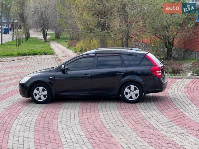 Чорний Кіа Сід, об'ємом двигуна 1.6 л та пробігом 218 тис. км за 5999 $, фото 4 на Automoto.ua