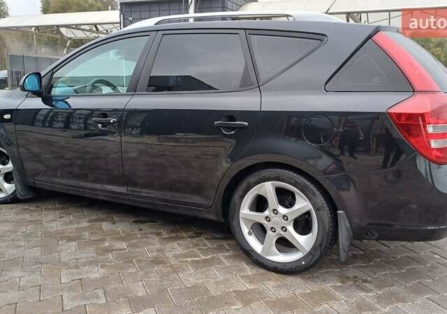 Черный Киа Сид, объемом двигателя 2 л и пробегом 195 тыс. км за 6499 $, фото 1 на Automoto.ua