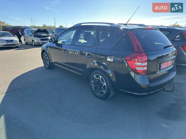 Черный Киа Сид, объемом двигателя 1.4 л и пробегом 182 тыс. км за 6200 $, фото 1 на Automoto.ua