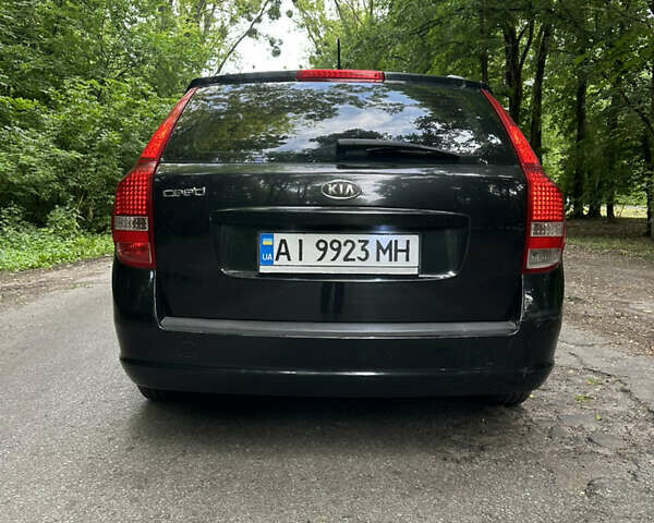 Чорний Кіа Сід, об'ємом двигуна 1.6 л та пробігом 252 тис. км за 6700 $, фото 2 на Automoto.ua