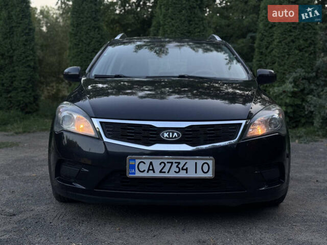 Чорний Кіа Сід, об'ємом двигуна 1.6 л та пробігом 200 тис. км за 7600 $, фото 2 на Automoto.ua