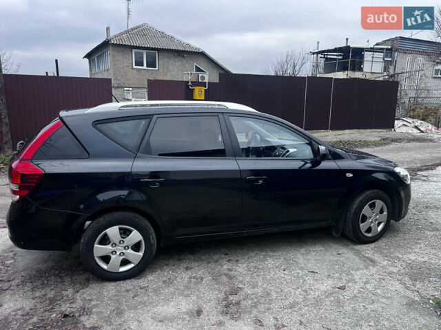 Чорний Кіа Сід, об'ємом двигуна 1.59 л та пробігом 208 тис. км за 6499 $, фото 3 на Automoto.ua