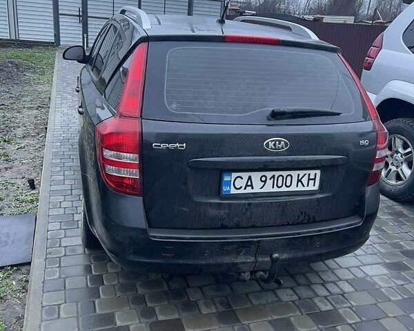 Чорний Кіа Сід, об'ємом двигуна 1.4 л та пробігом 175 тис. км за 5800 $, фото 1 на Automoto.ua