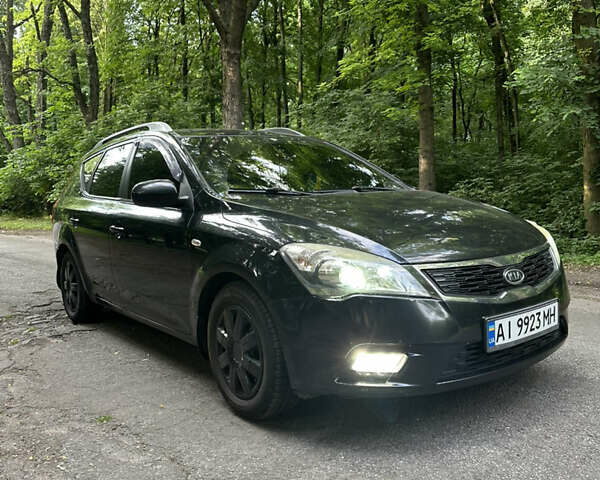 Чорний Кіа Сід, об'ємом двигуна 1.6 л та пробігом 252 тис. км за 6700 $, фото 1 на Automoto.ua