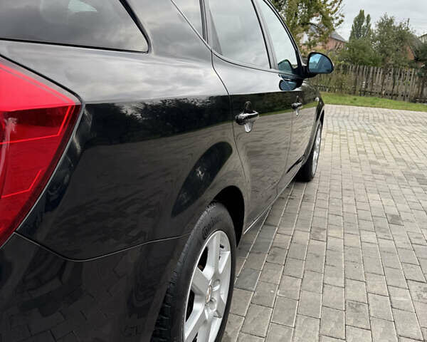 Чорний Кіа Сід, об'ємом двигуна 1.4 л та пробігом 170 тис. км за 6500 $, фото 8 на Automoto.ua
