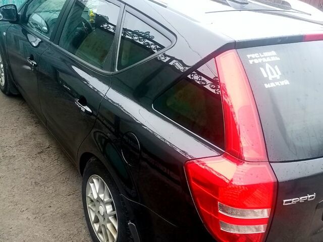 Чорний Кіа Сід, об'ємом двигуна 1.6 л та пробігом 466 тис. км за 5350 $, фото 4 на Automoto.ua