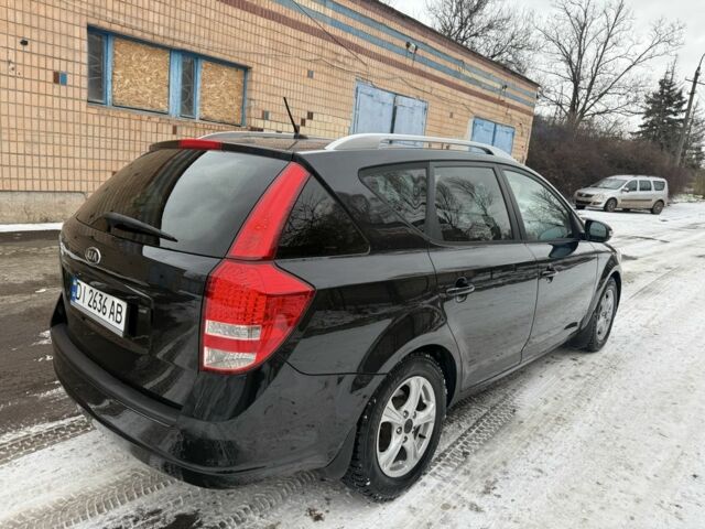Чорний Кіа Сід, об'ємом двигуна 1.6 л та пробігом 238 тис. км за 6900 $, фото 5 на Automoto.ua