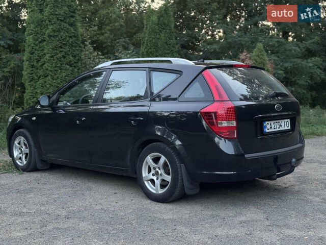Чорний Кіа Сід, об'ємом двигуна 1.6 л та пробігом 200 тис. км за 7600 $, фото 3 на Automoto.ua