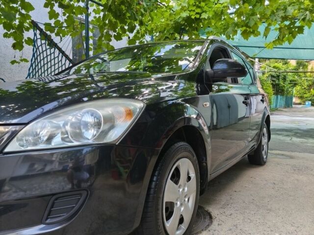 Черный Киа Сид, объемом двигателя 1.4 л и пробегом 190 тыс. км за 6300 $, фото 1 на Automoto.ua