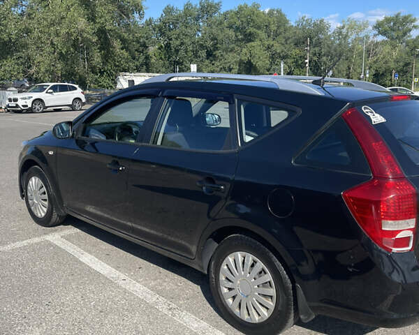 Чорний Кіа Сід, об'ємом двигуна 1.4 л та пробігом 211 тис. км за 5900 $, фото 5 на Automoto.ua