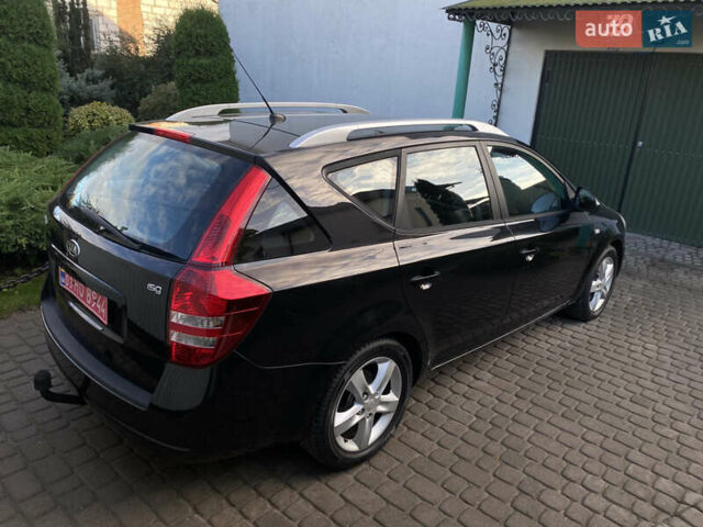 Чорний Кіа Сід, об'ємом двигуна 1.4 л та пробігом 207 тис. км за 5850 $, фото 4 на Automoto.ua