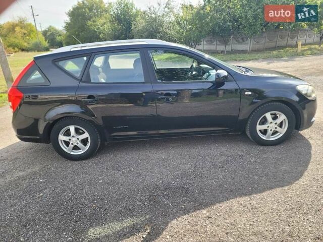 Чорний Кіа Сід, об'ємом двигуна 1.4 л та пробігом 212 тис. км за 6200 $, фото 4 на Automoto.ua