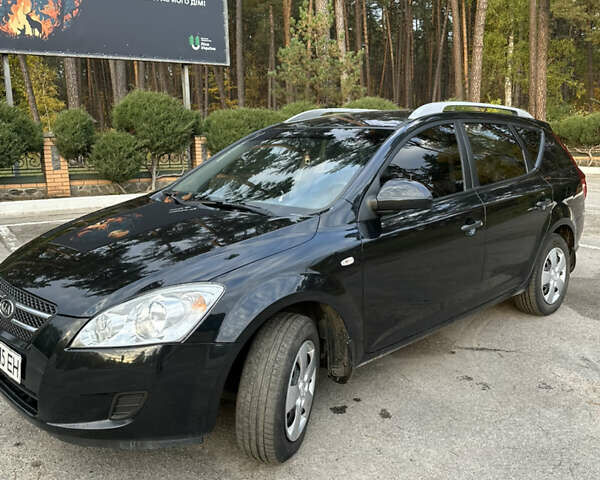 Черный Киа Сид, объемом двигателя 1.6 л и пробегом 127 тыс. км за 7300 $, фото 1 на Automoto.ua
