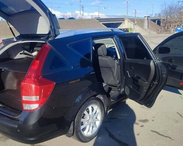 Черный Киа Сид, объемом двигателя 1.4 л и пробегом 200 тыс. км за 5600 $, фото 3 на Automoto.ua