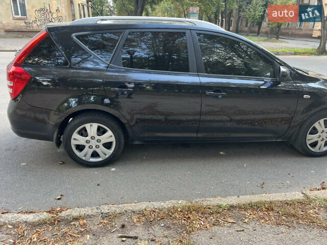 Черный Киа Сид, объемом двигателя 1.58 л и пробегом 245 тыс. км за 6500 $, фото 6 на Automoto.ua