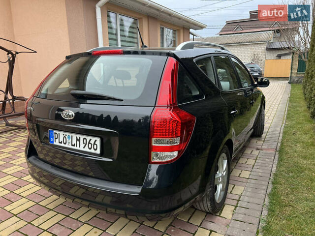 Чорний Кіа Сід, об'ємом двигуна 1.6 л та пробігом 173 тис. км за 7750 $, фото 24 на Automoto.ua