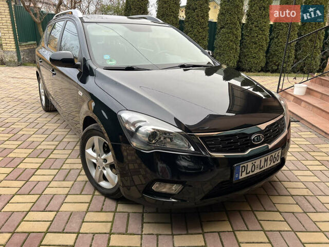 Чорний Кіа Сід, об'ємом двигуна 1.6 л та пробігом 173 тис. км за 7750 $, фото 1 на Automoto.ua