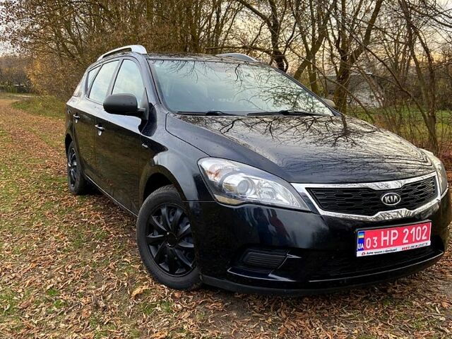 Черный Киа Сид, объемом двигателя 1.4 л и пробегом 205 тыс. км за 6200 $, фото 10 на Automoto.ua