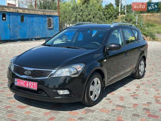 Черный Киа Сид, объемом двигателя 1.4 л и пробегом 189 тыс. км за 7000 $, фото 4 на Automoto.ua