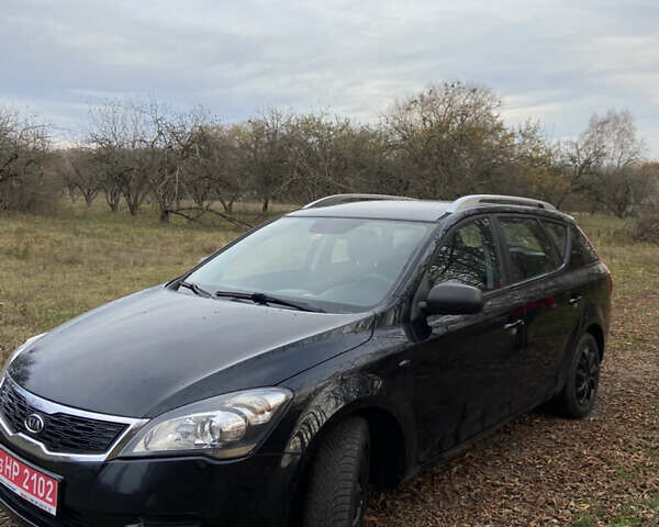 Чорний Кіа Сід, об'ємом двигуна 1.4 л та пробігом 205 тис. км за 6300 $, фото 4 на Automoto.ua