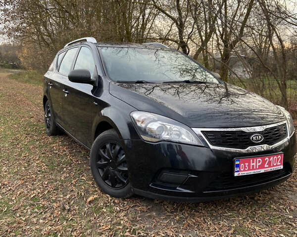 Чорний Кіа Сід, об'ємом двигуна 1.4 л та пробігом 205 тис. км за 6300 $, фото 10 на Automoto.ua