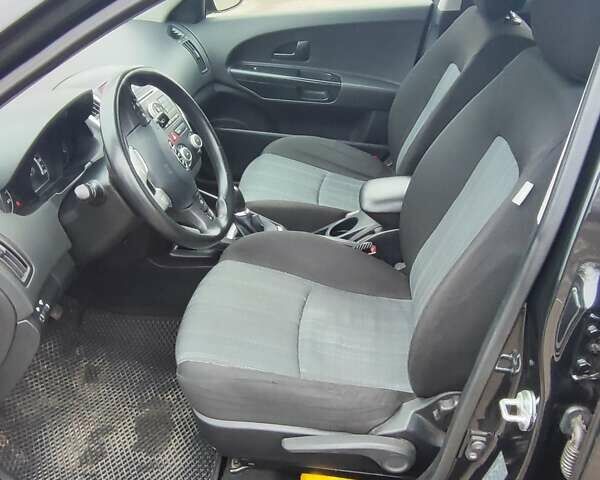 Черный Киа Сид, объемом двигателя 1.4 л и пробегом 175 тыс. км за 7500 $, фото 9 на Automoto.ua