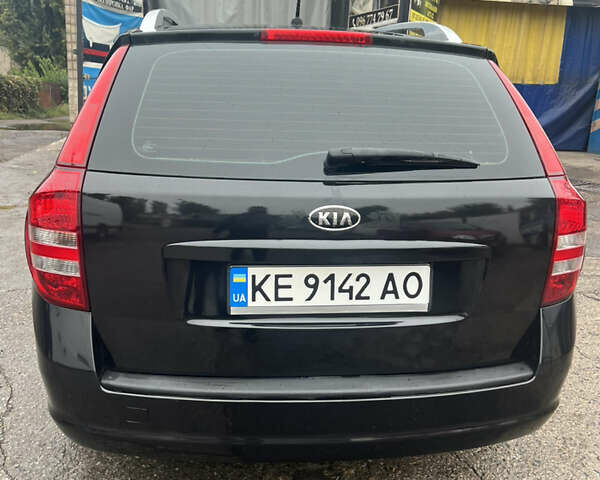 Черный Киа Сид, объемом двигателя 1.58 л и пробегом 245 тыс. км за 6500 $, фото 4 на Automoto.ua